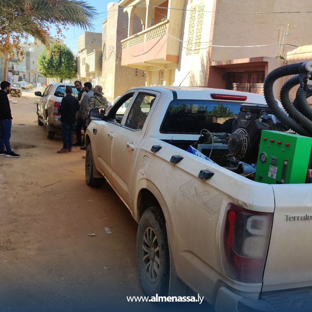 بلاى 1  فريق الإصحاح البيئي يقف على أضرار مستشفى ترهونة وآبار المياه المتضررة جراء السيول